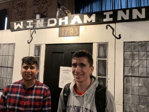 Students Armando Ramirez and Matthew        Gallagher at the Windham Inn Exhibit