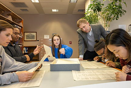 students reviewing documents