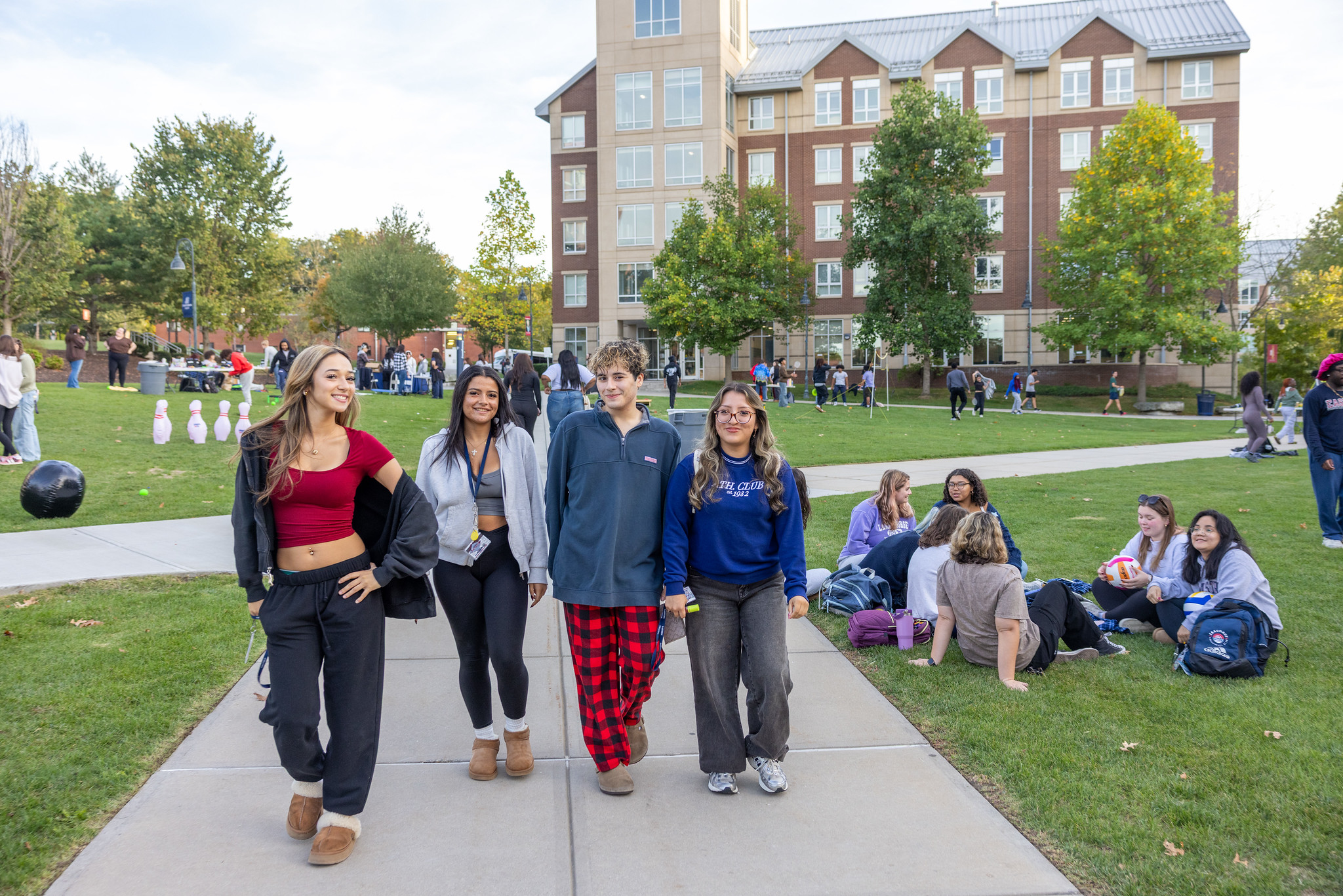 Students walking and gathering on the campus quad