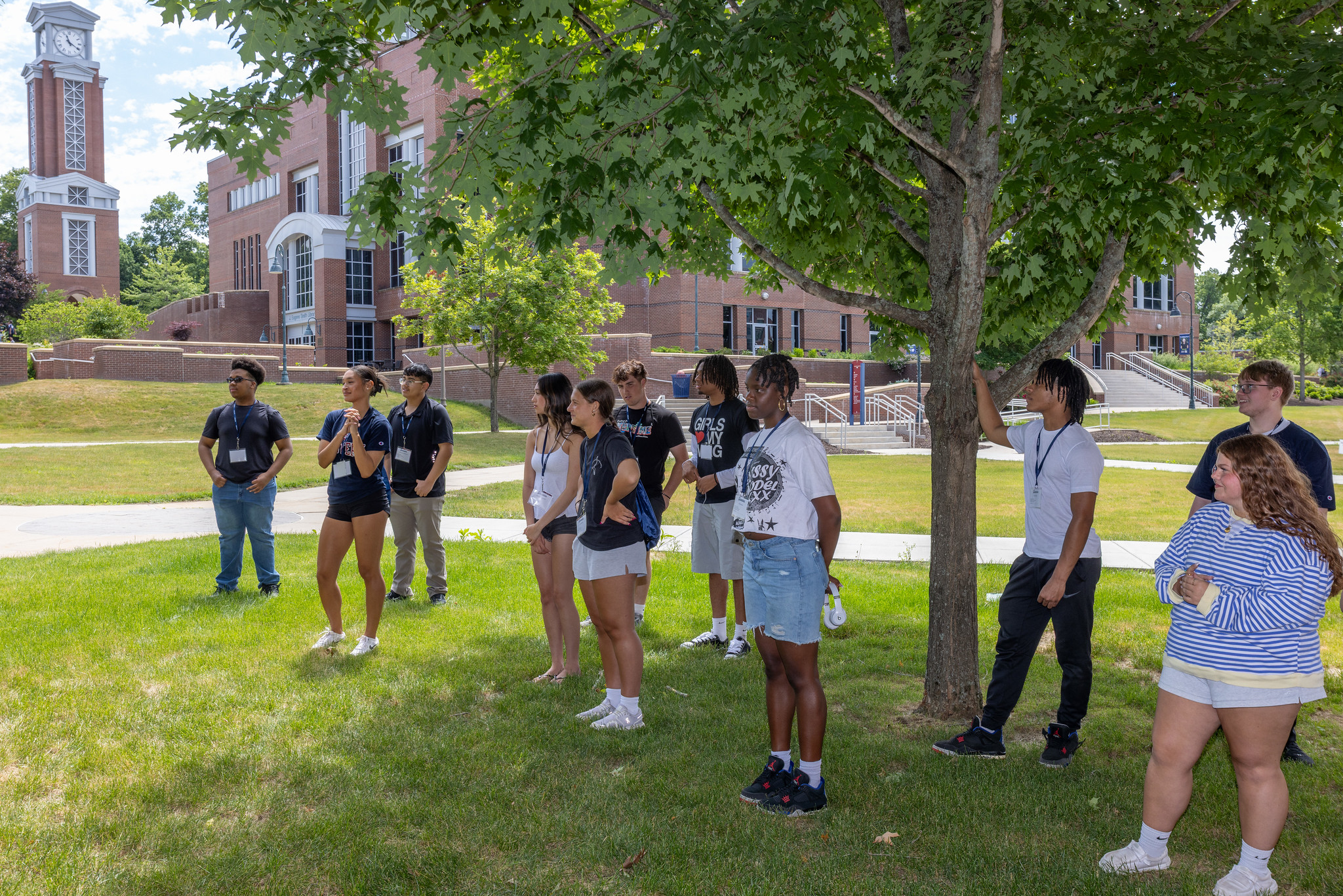 Prospective students on a campus tour near the clock tower