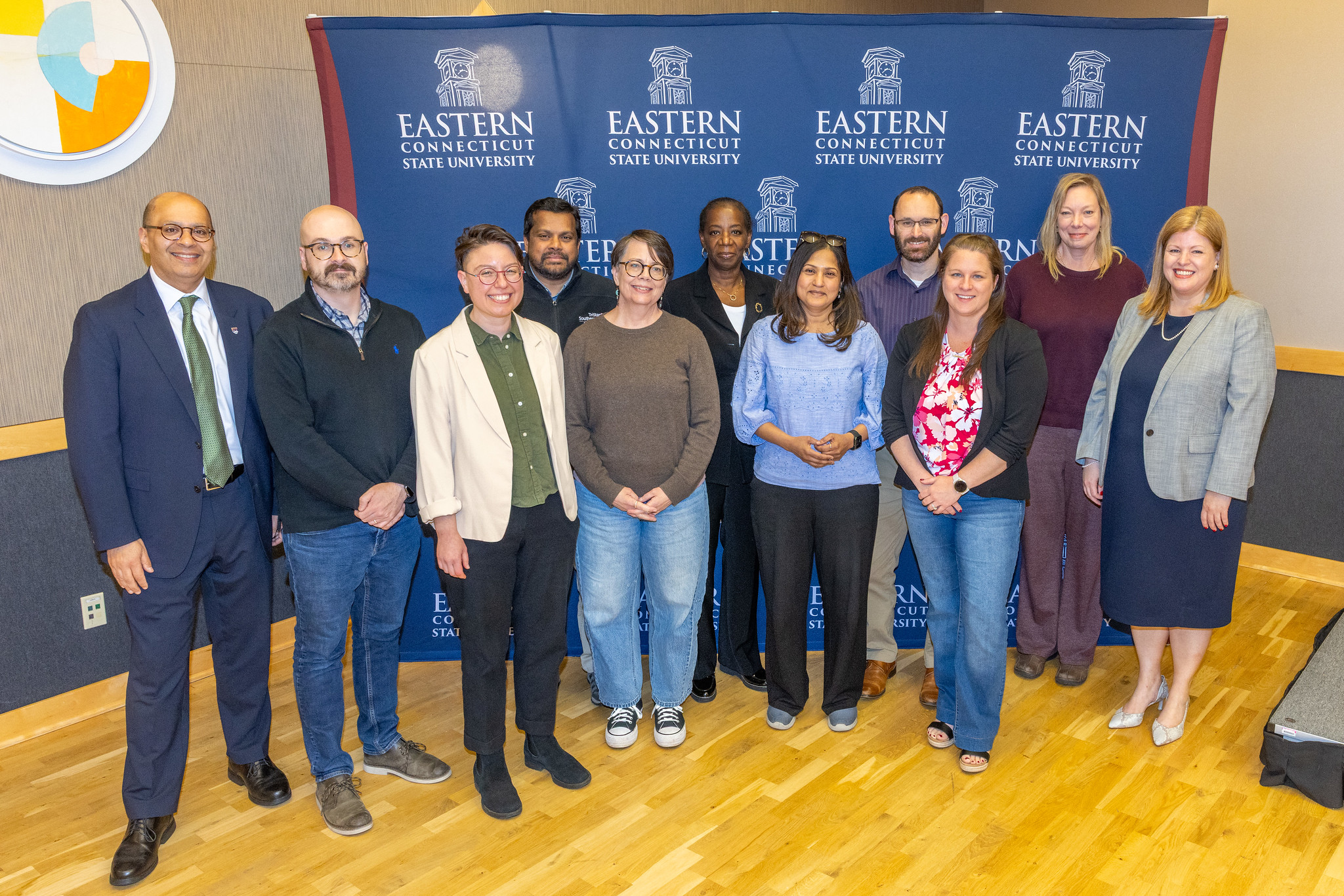 Faculty and staff gathered with President Ismaili at the Faculty Celebration of Excellence