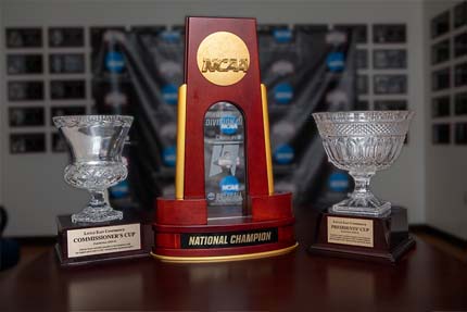 The Commissioner's Cup, National Champion Division III trophy, and Presidents' Cup