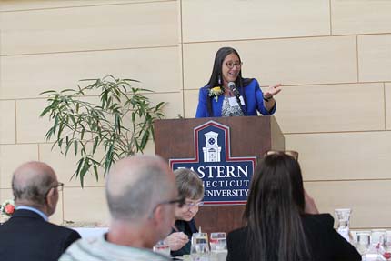 Beth Regan speaking at the luncheon