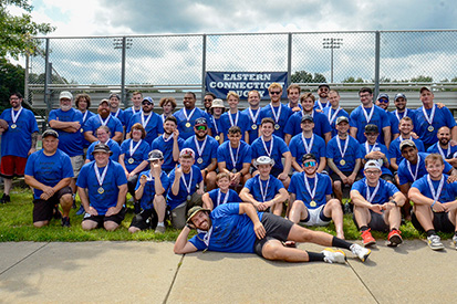 Current and former members of Eastern's men's rugby team volunteer at the Special Olympics Rugby Clinic in 2024.
