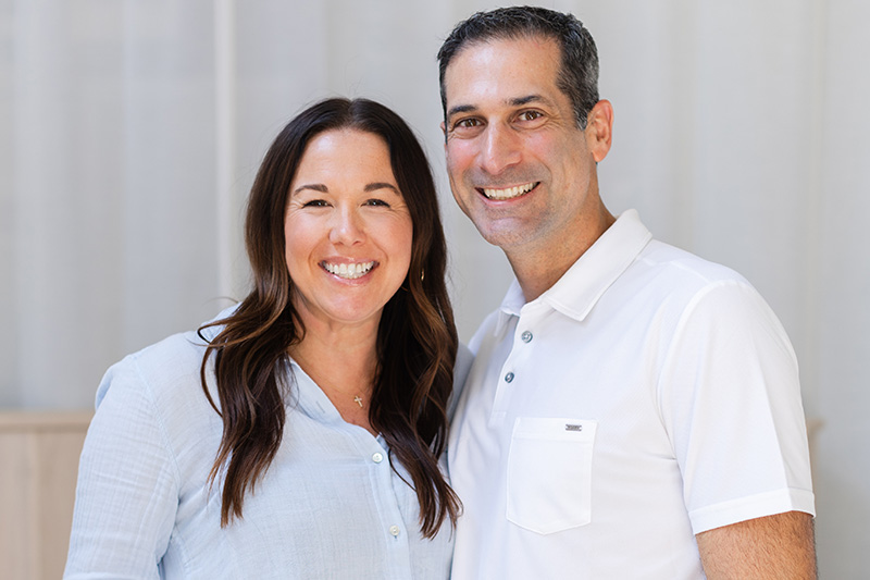Jessica and Jeff Reinhard smiling