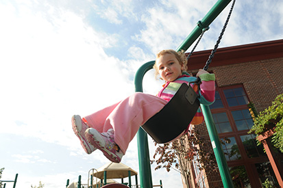 child swinging