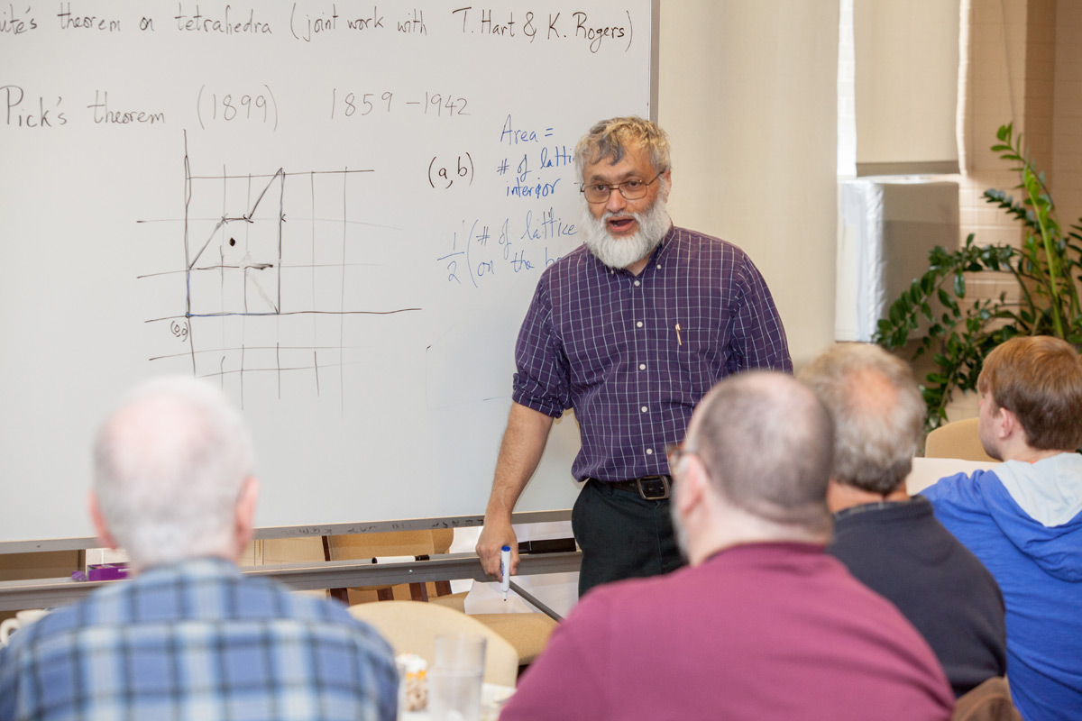 Professor teaching in front of class