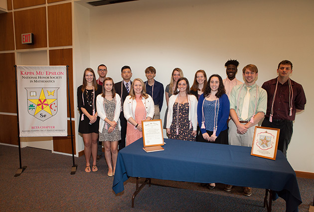 a group of students at a math honor society gathering