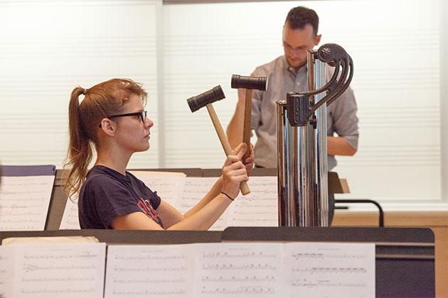 Student musicians playing instruments