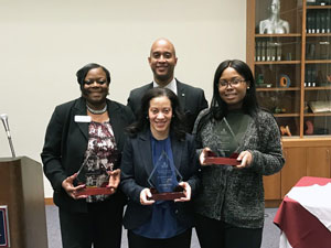 Award recipients pose for the camera.