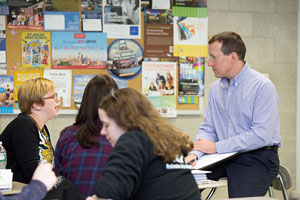 Mark Fabrizi speaks with faculty memebers