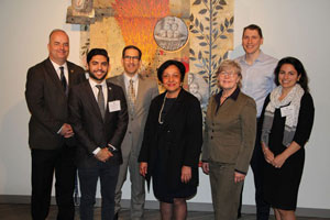 Legislators, President Núñez, and students pose for the camera