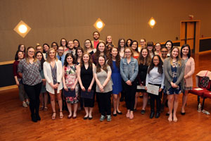 Psychology students pose for the camera.