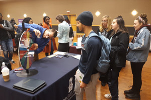 Students line up for a chance to win a prize.