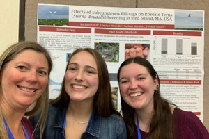 Professor Patricia Szczys and Eastern student's Rachael Finch and Brittany Velikaneye pose for a photo together.