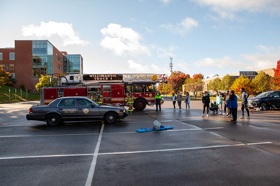 Eastern students with Willimantic Fire Department 