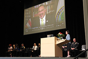 Isabel Logan, Eastern social work professor and co-director of the SWLE Project, presents pre-recorded remarks by U.S. Secretary of Education Miguel Cardona.