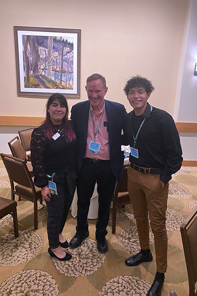 Students Edgar Escutia ('24) and Frida Nieto-Gonzalez ('24), Opportunity Scholars who attended the event with Donald Graham, founder of TheDream.US.  