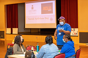 Anderson Curtis speaks to attendees of ACLU event. 