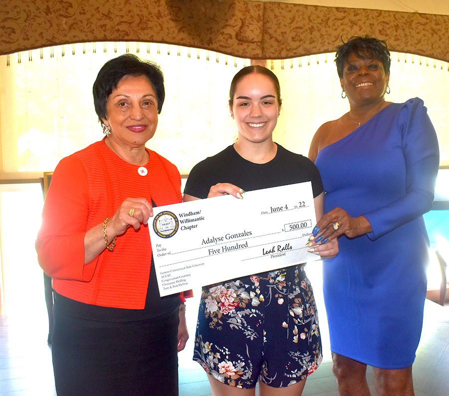Eastern President Elsa Nunez, left, and NAACP President Leah Ralls, right, congratulate Adalyse Gonzales on winning an NAACP scholarship.