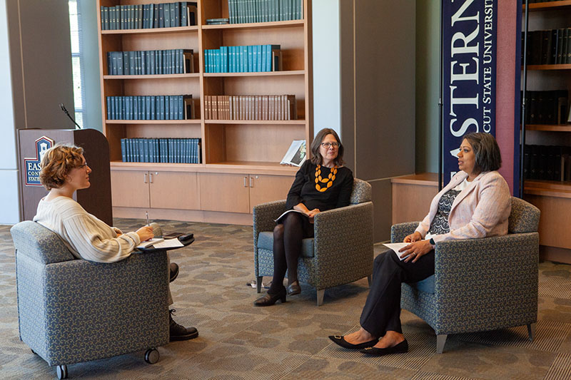 Emily Todd (left) and Niti Pandey (right) sit down with University Relations student writer Molly Boucher. 