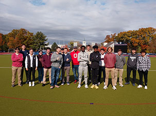 business students at field hockey