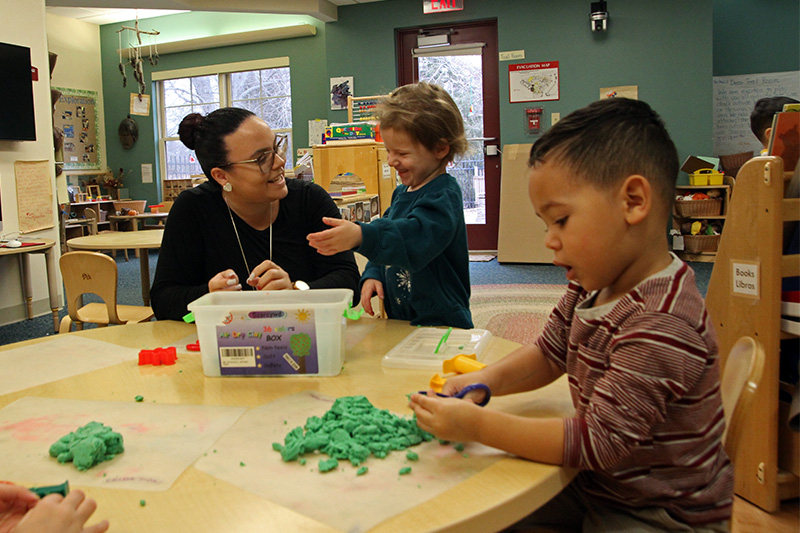 Preschool teacher Karla Alamo interacts with preschool students