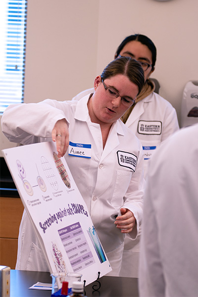 biology student demonstrating technique