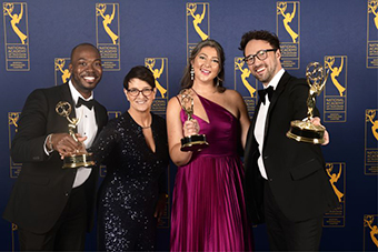 Saunders (second from right)