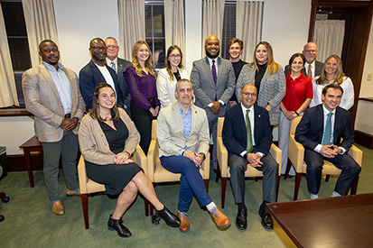 Back row, left to right: Kendrick Constant '18, Milton Jackson '05, Brian Green '10, Raena Beetham '13, Amanda Piazza '20, Kevin Booker '00 '08 '10, Joseph Morgan '23, Amelinda Rossitto '10, Lauren Sposato '13, Interim Chief Development Officer Philip Ellmore, University Events and Engagement Director Candace DeAngelis '98. Front row, left to right: Shannon (Mumley) Frost '10, Director of Alumni Communication and Advancement Christopher Dorsey '96, Eastern President Karim Ismaili, James Woulfe '09.