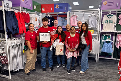 Junior finance major Ellis Thompson (second from left) with his team at Target