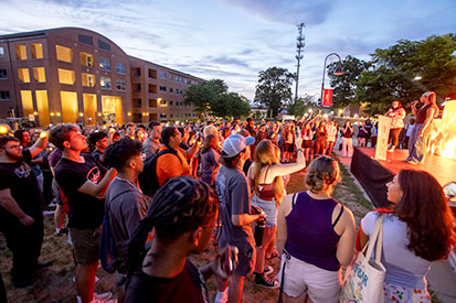 Students gather at "Light the Way" ceremony