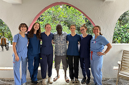 Health Sciences students pose with Ghanian midwives.