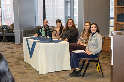 History Department Chair Caitlin Carenen introduces the alumni