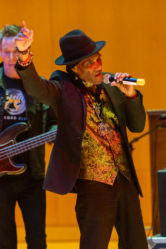 A singer onstage at "Take Me to the River All Stars"