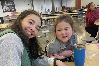 Emily Conte does arts and crafts with a little one