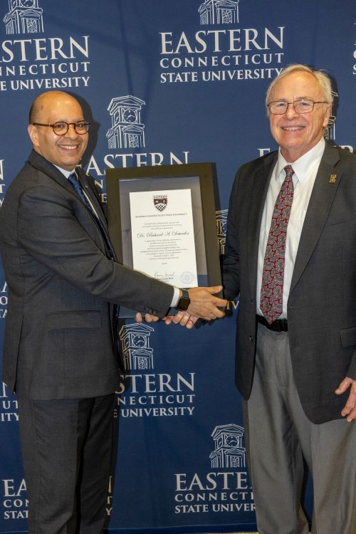 Richard Detweiler (right) and President Karim Ismaili