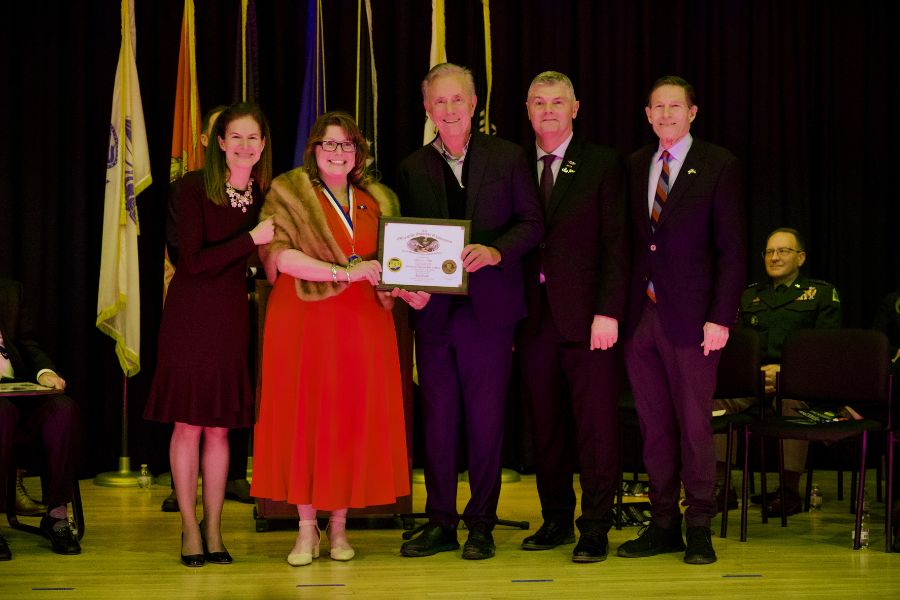Lt. Governor Susan Bysiewicz, Sherri Vogt '94, Gov. Ned Lamont, Commissioner Ron Welch '92 of Connecticut Veterans Affairs, U.S. Senator Richard Blumenthal at the Connecticut Veterans Hall of Fame ceremony in January 2026. 