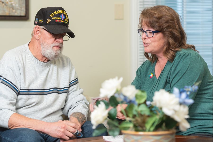 Vogt speaks with a Marine Veteran