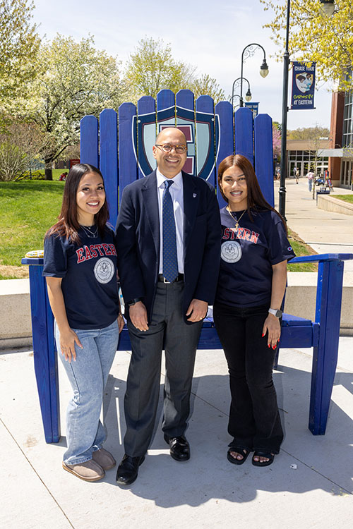 Eastern President Karim Ismaili (center) and students.