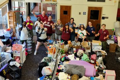 Volunteers gather at the Thrift Warriors thrift store.