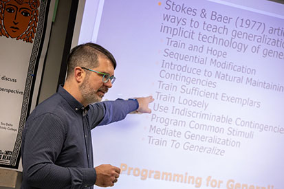 Psychology professor James Diller presents a lecture.