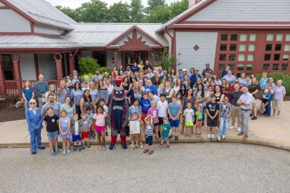 Guests gather at Eastern Connecticut State University's Child and Family Development Resource Center to celebrate the center's 20th anniversary on June 26.