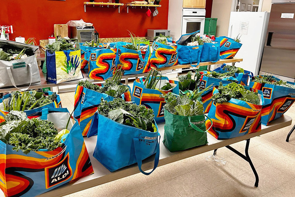 About 35 food bags being packed.
