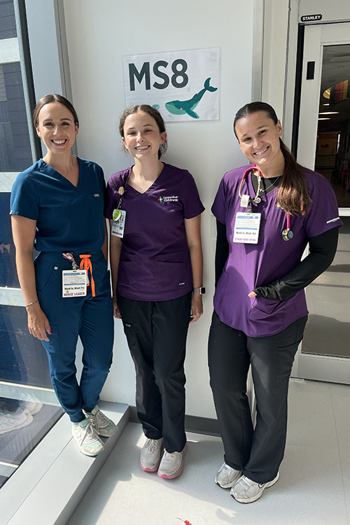 Sierra with nurses at Connecticut Children's Medical Center.