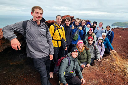 Students from "Global Studies in Psychology" visit Eldfell Volcano on the island of Heimaey.