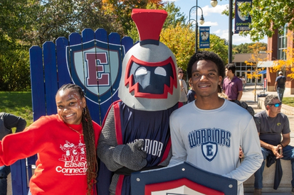 Students posing with Willi the Warrior 