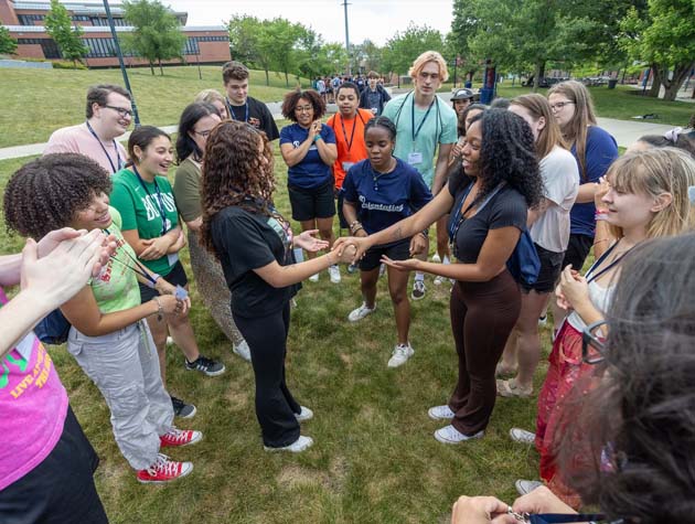 students gathering in a circle