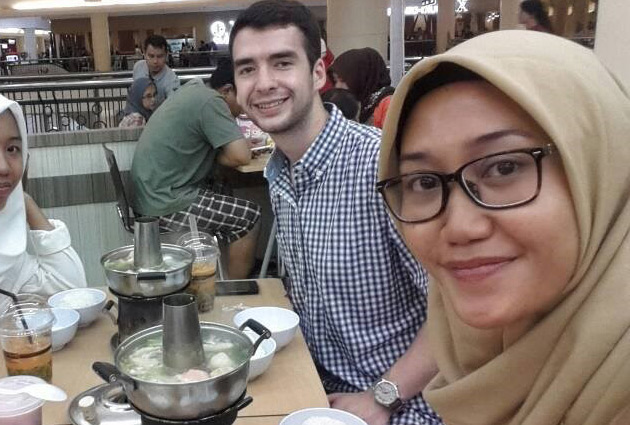 student in Indonesia having tea with friends