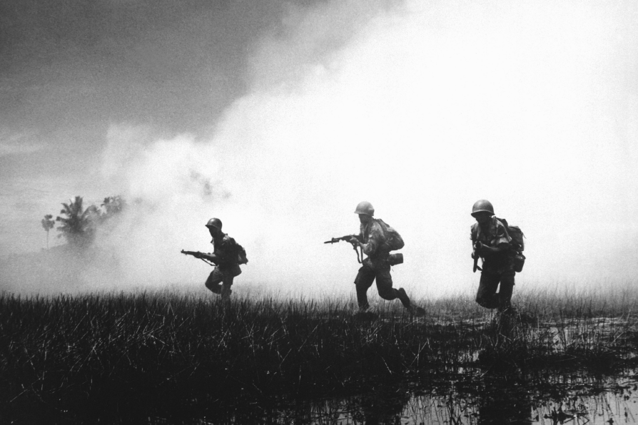 soldiers on the battlefield with fog in the background